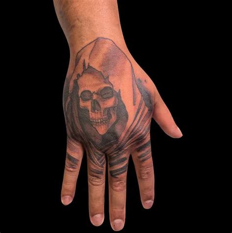 Hand Grim Reaper tattoo